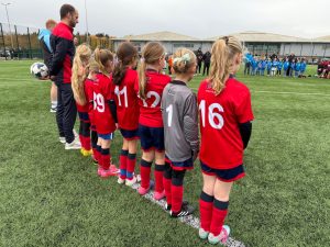 Players observe a minute’s silence before kick-off on Remembrance Sunday.