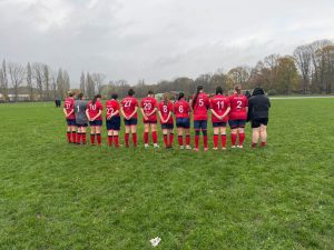 Players observe a minute’s silence before kick-off on Remembrance Sunday.