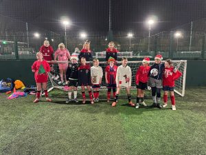 North Cardiff Cosmos FC Under 11 Girls celebrating Christmas