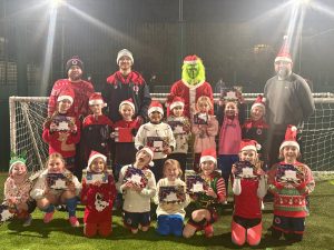 North Cardiff Cosmos FC Under 7 Girls celebrating Christmas