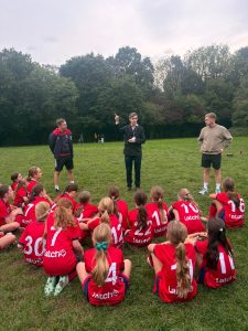 North Cardiff Cosmos Under 10 Girls proudly displaying their Latch charity shirt sponsorship.
